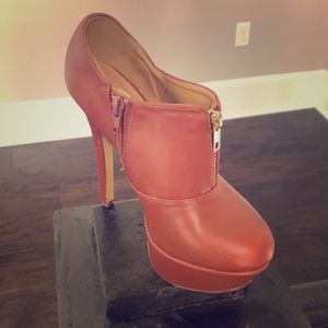 4.5in tan pump boots. Never worn.